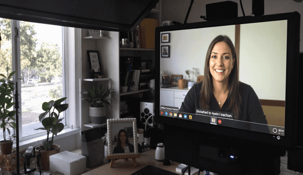 An educator using our autocue teleprompter for an online course.